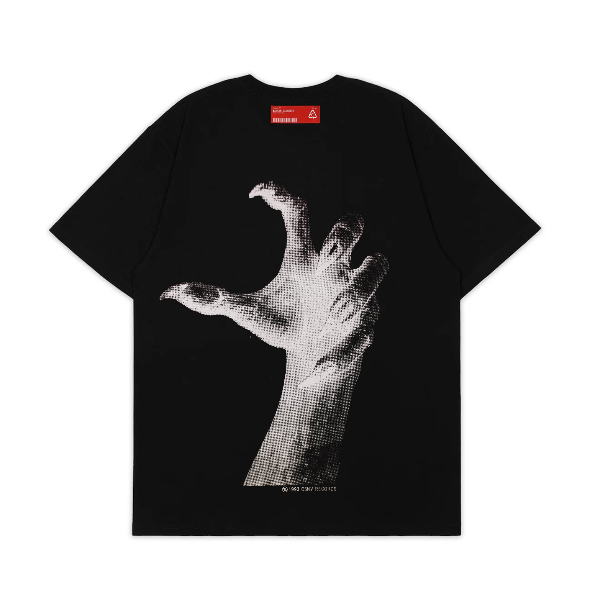 黒い半袖Tシャツの背面。中央に、鋭い爪を持つ手のモノクログラフィック（ハーフトーン調）が大きくプリントされている。グラフィックの下には「© 1993 CSNV RECORDS」の小さなテキスト。背面の首元部分には、赤い長方形のブランドタグが配置されている。